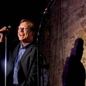 Andy Daly performing