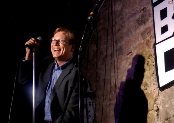 Andy Daly performing